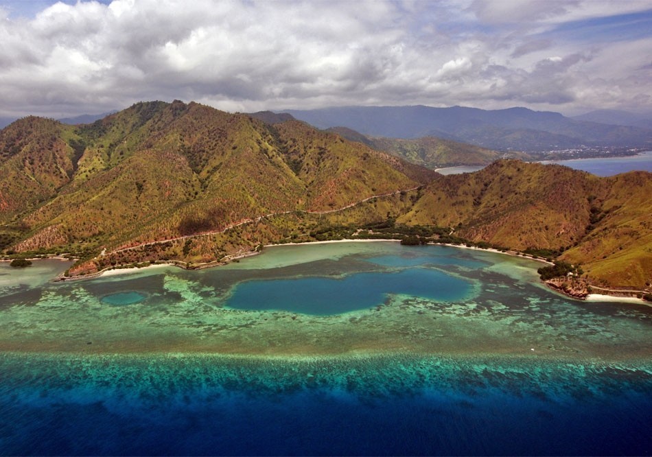 Aerial views of the approach to Dili, Timor-Leste. | Top 10 Backpacking Destinations Around the World