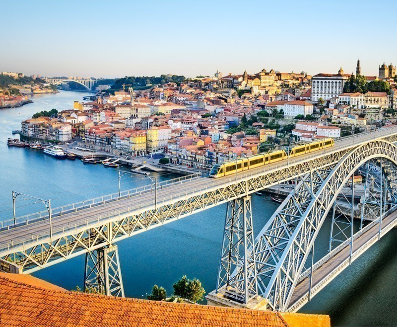 Beautiful view of Porto with the Dom Luiz bridge | Portugal Travel Guide: What to Do and See