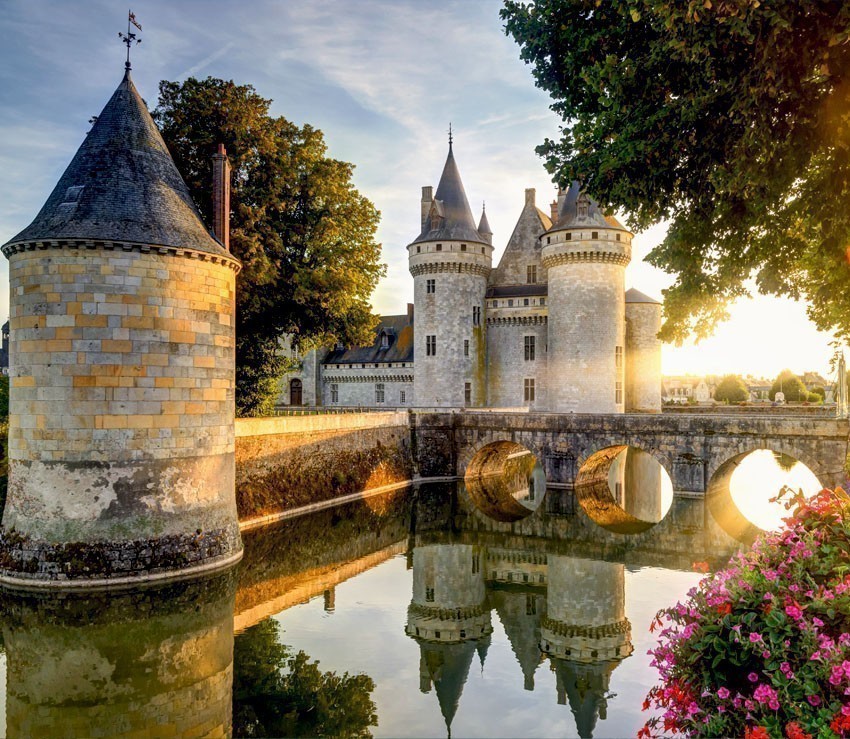 The chateau of Sully-sur-Loire. This castle is located in the Loire Valley, dates from the 14th century | France Travel Guide