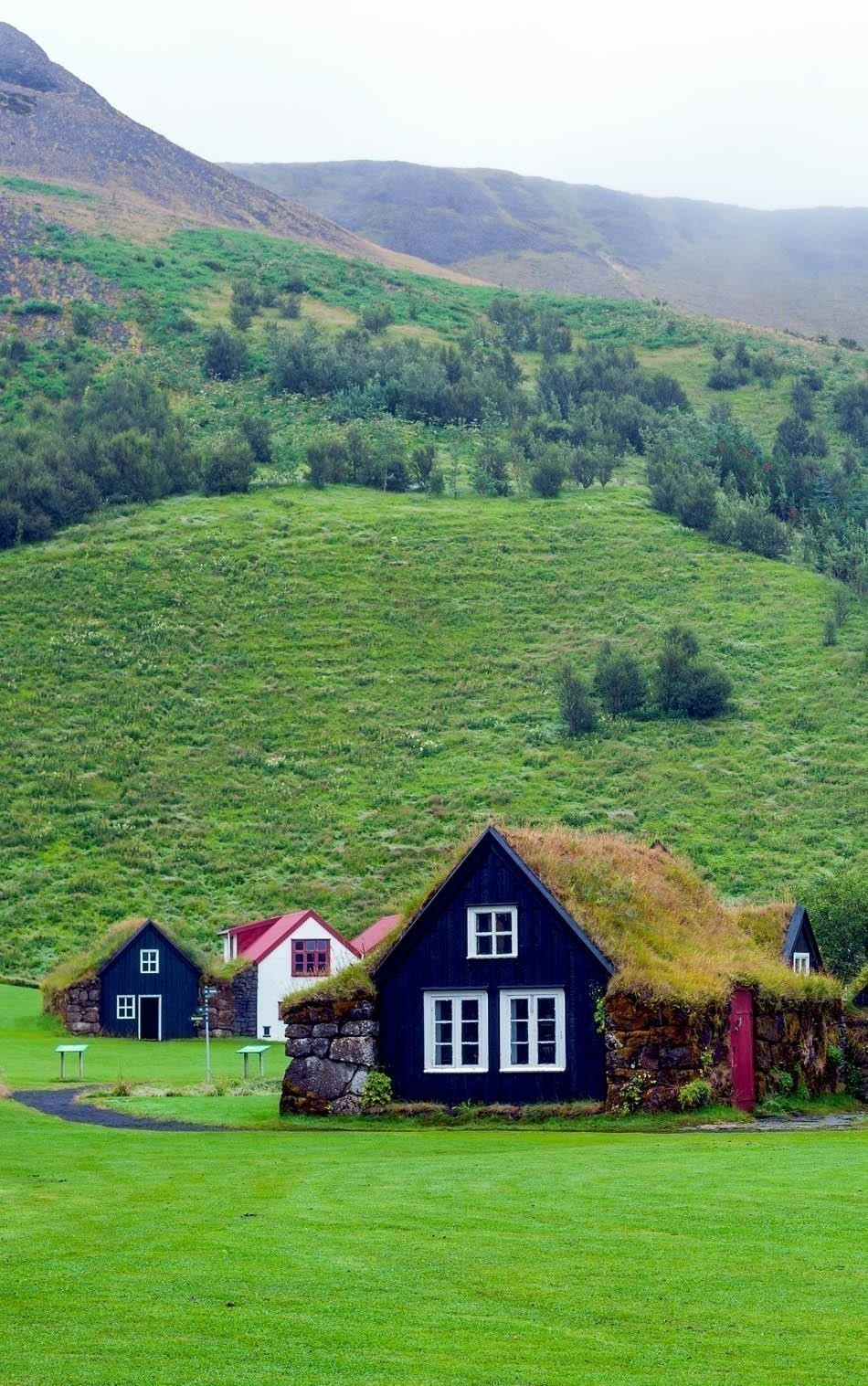 Traditional Icelandic House with grass roof in Skogar Folk Museum, Iceland | Iceland Travel Guide