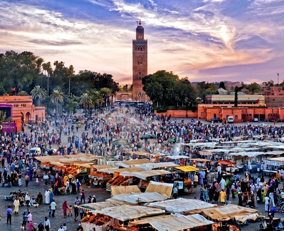Jemaa el Fna Square at sunset in Marrakesh, Morocco. The square is part of the UNESCO World Heritage.