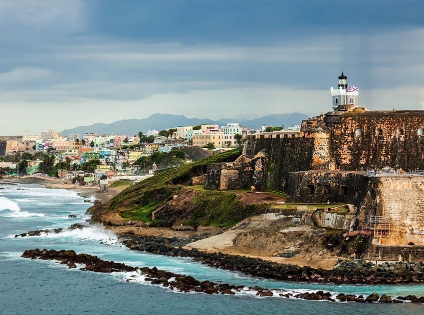 Crashing surf on the beach at El Morro Fortress San Juan | Puerto Rico Travel Guide