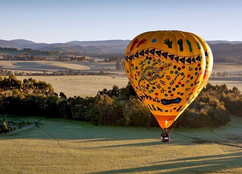 A sunrise hot air balloon flight over the Yarra Valley in Victoria, Australia | 10 Best Hot Air Balloon Rides Around The World