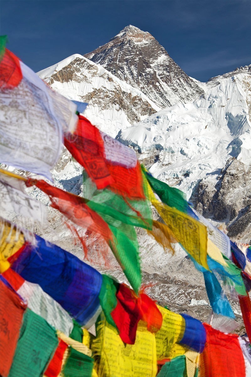 View of Mount Everest with buddhist prayer flags from Kala Patthar, Nepal | TOP 10 Places To Travel in May