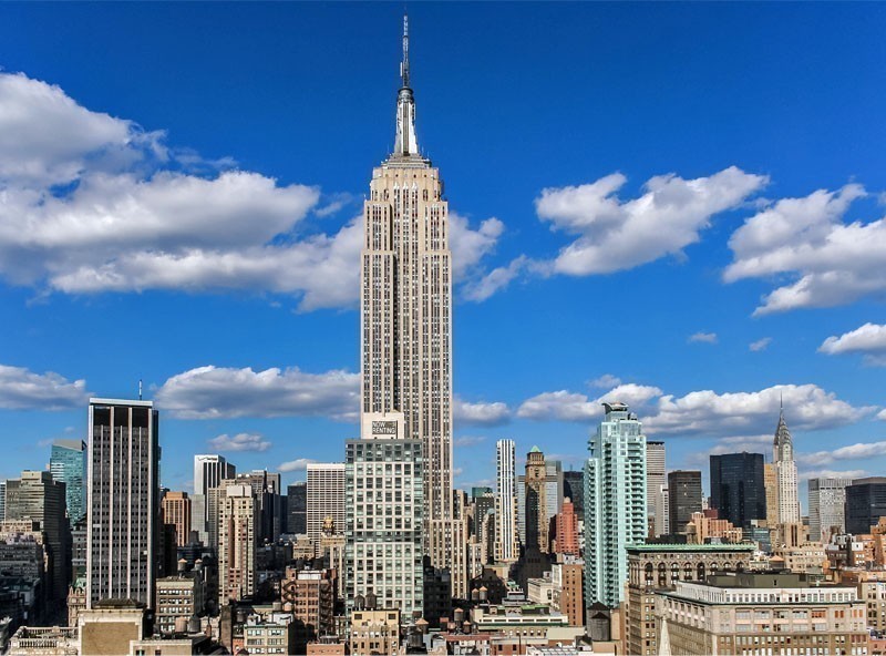 View over the Empire State Building from a roof top in New York City | TOP 10 Tourist Attractions in New York City